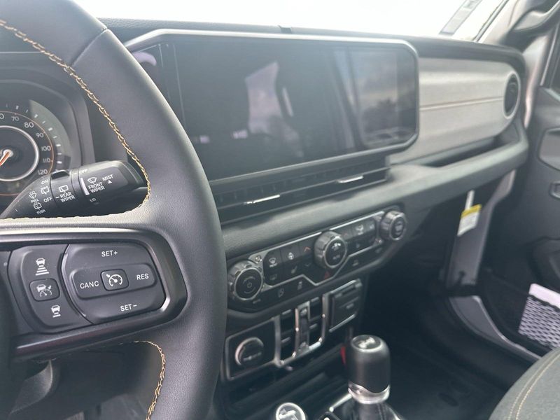 2024 Jeep Wrangler 4-door Sport S in a Silver Zynith Clear Coat exterior color and Blackinterior. Gupton Motors Inc 615-384-2886 guptonmotors.com 