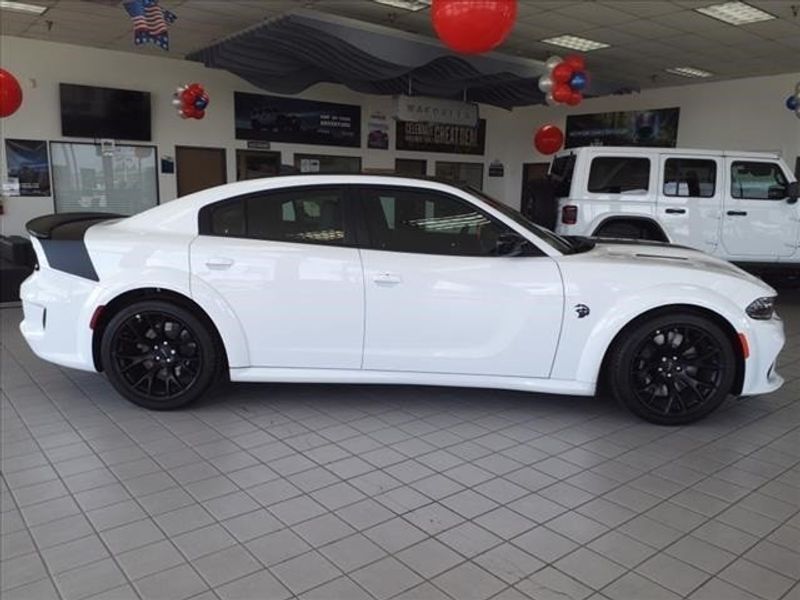 2023 Dodge Charger SRT Hellcat Widebody in a White Knuckle Clear Coat exterior color and Blackinterior. Perris Valley Auto Center 951-657-6100 perrisvalleyautocenter.com 