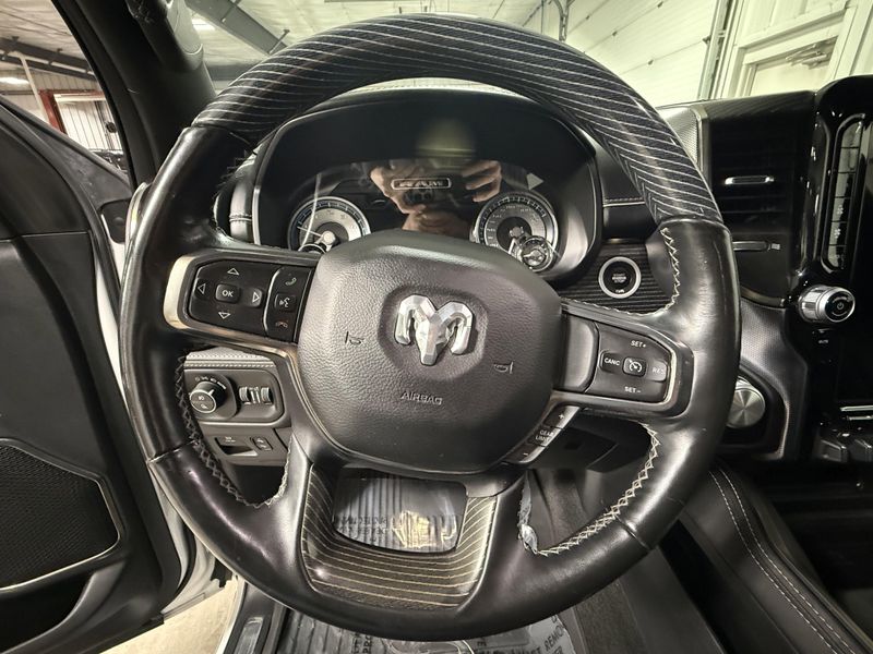Used 2020 RAM 1500 Limited in a Ivory White Tri Coat Pearl Coat exterior color and Blackinterior. Thys Motor Company 319-318-6640 thysmotorco.com 