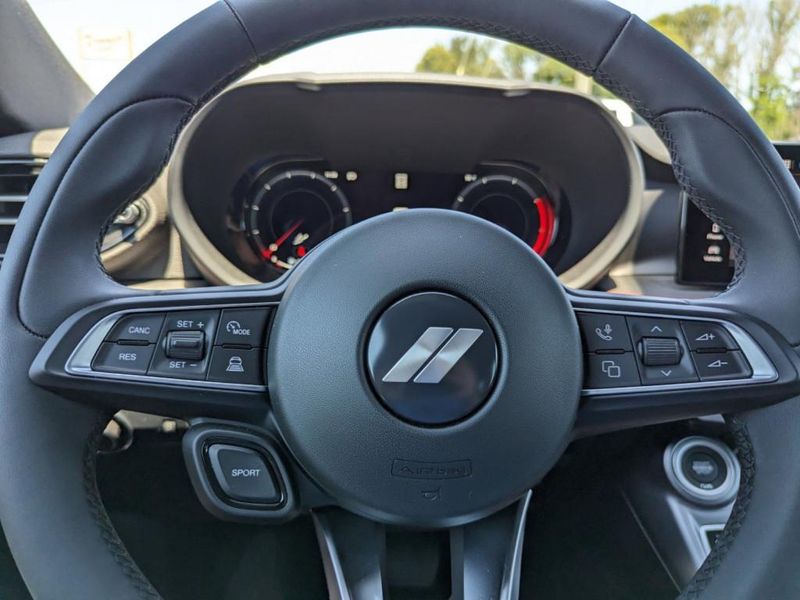 2023 Dodge Hornet Gt Awd in a Acapulco Gold exterior color and Blackinterior. Johnson Dodge 601-693-6343 pixelmotiondemo.com 