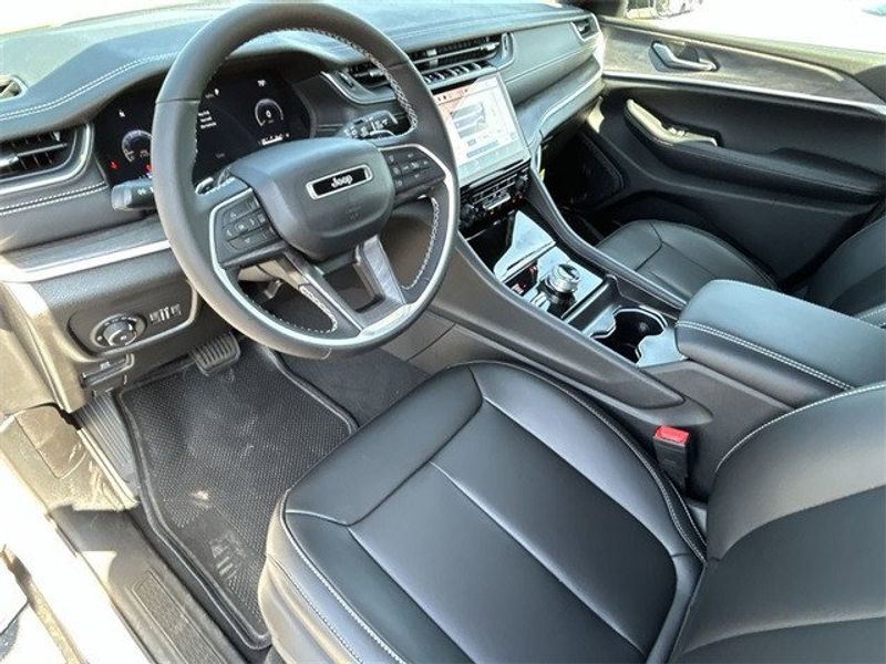 2024 Jeep Grand Cherokee Limited 4x4 in a Bright White Clear Coat exterior color. McPeek