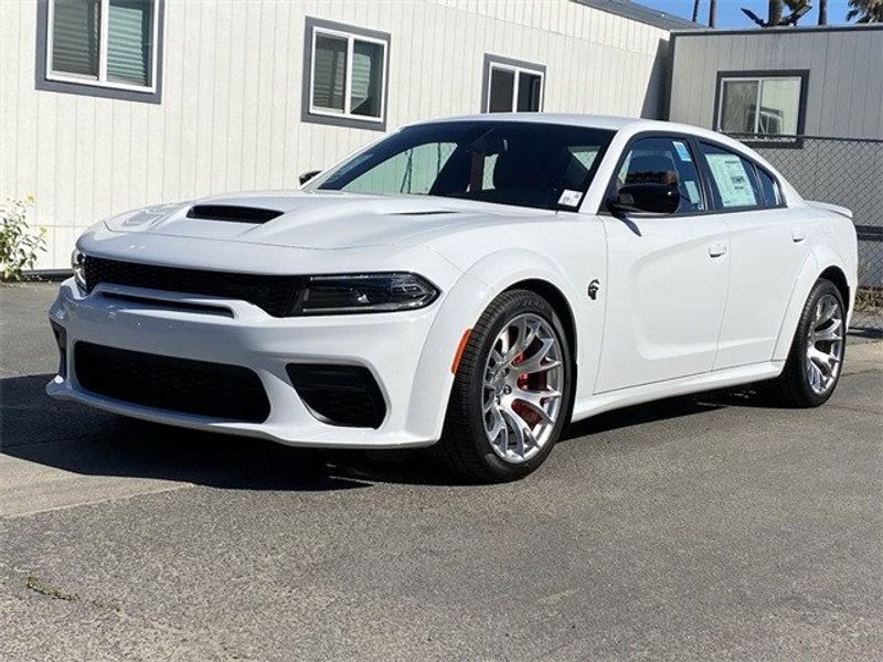2023 Dodge Charger Srt Hellcat Widebody Jailbreak in a White Knuckle exterior color and Demonic Red/Blackinterior. McPeek