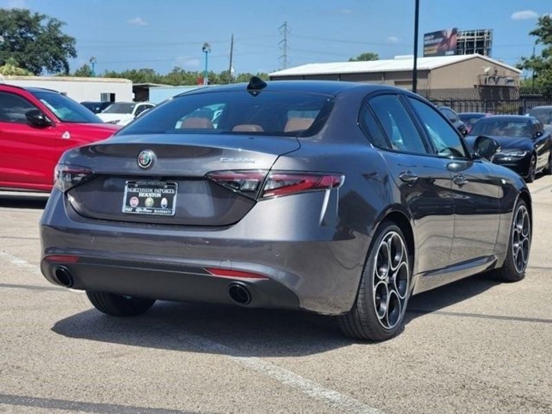 2024 Alfa Romeo Giulia Ti in a Vesuvio Gray Metallic exterior color and Blackinterior. Northside Imports Houston 281-475-4549 northsideimportshouston.com 