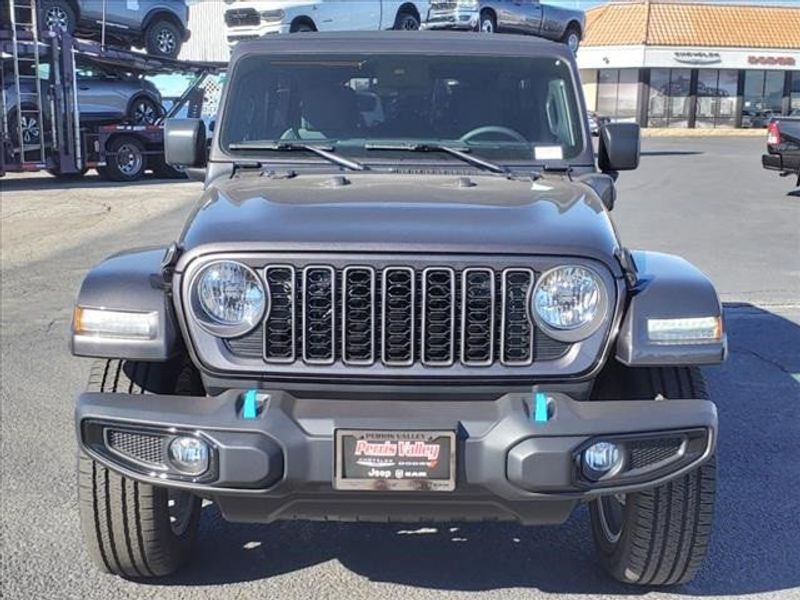 2024 Jeep Wrangler Sport S 4xe in a Granite Crystal Metallic Clear Coat exterior color and Blackinterior. Perris Valley Auto Center 951-657-6100 perrisvalleyautocenter.com 