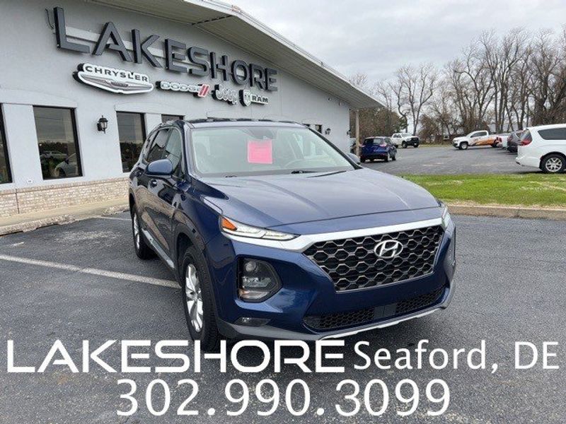 2020 Hyundai Santa Fe SEL 2.4 in a Stormy Sea exterior color and Espresso/Grayinterior. Lakeshore CDJR Seaford 302-213-6058 lakeshorecdjr.com 