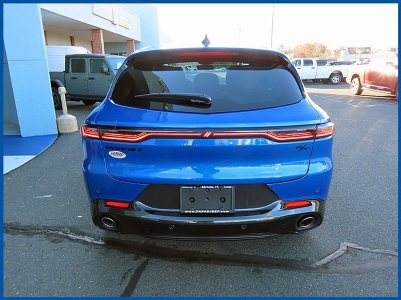 2024 Dodge Hornet R/T in a Blu Bayou exterior color and Blackinterior. Papas Jeep Ram In New Britain, CT 860-356-0523 papasjeepram.com 