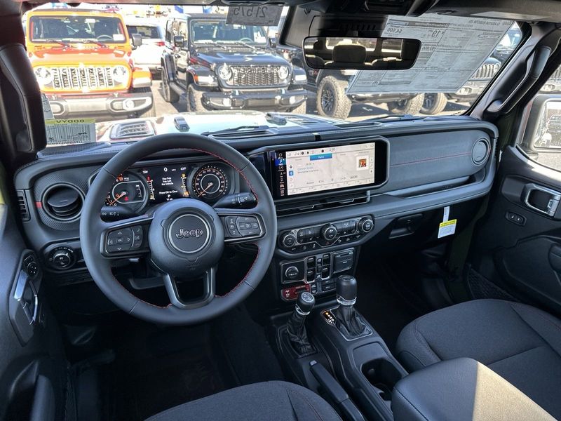 2024 Jeep Gladiator Rubicon 4x4 in a Sarge Green Clear Coat exterior color. Gupton Motors Inc 615-384-2886 guptonmotors.com 