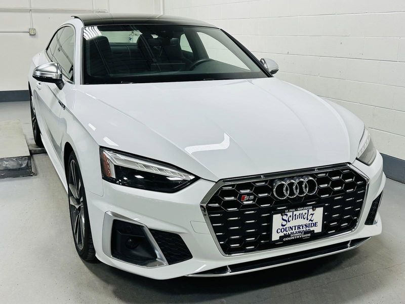 2022 Audi S5 Coupe Premium Plus AWD w/Nav in a Glacier White Metallic exterior color and Black Heated Leatherinterior. Schmelz Countryside SAAB (888) 558-1064 stpaulsaab.com 