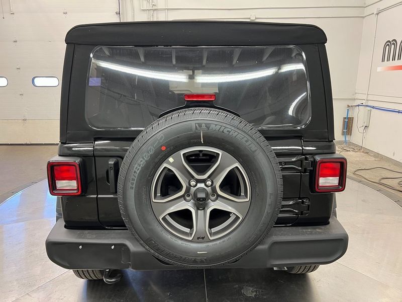 2023 Jeep Wrangler 4-door Sport S 4x4 in a Black Clear Coat exterior color and Blackinterior. Marina Chrysler Dodge Jeep RAM (855) 616-8084 marinadodgeny.com 