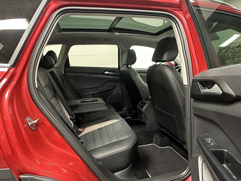 2022 Volkswagen Taos SEL AWD w/Sunroof & Nav in a Kings Red Metallic exterior color and French Roast/Black Heated Leatherinterior. Schmelz Countryside Alfa Romeo (651) 867-3222 schmelzalfaromeo.com 