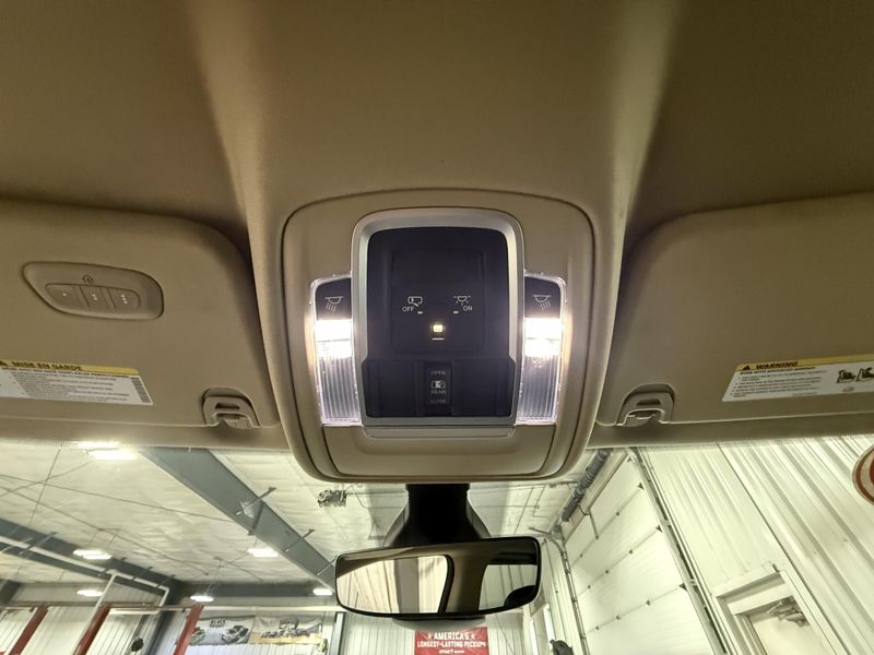 Used 2020 RAM 1500 Laramie in a Bright White Clear Coat exterior color and Blackinterior. Thys Motor Company 319-318-6640 thysmotorco.com 