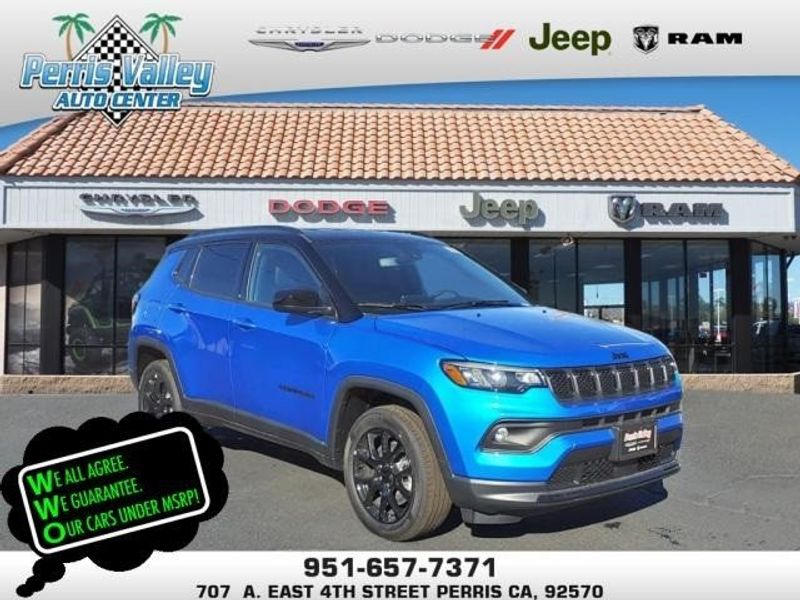2024 Jeep Compass Latitude in a Laser Blue Pearl Coat exterior color and Blackinterior. Perris Valley Auto Center 951-657-6100 perrisvalleyautocenter.com 