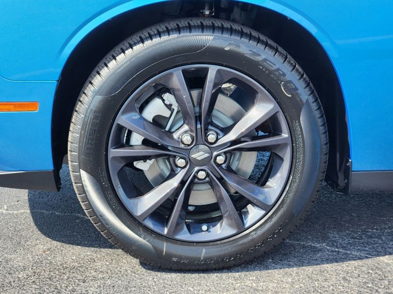 2023 Dodge Challenger SXT Awd in a B5 Blue exterior color and Blackinterior. Elder Chrysler Dodge Jeep Ram 9032920419 elderchryslerdodgejeep.com 