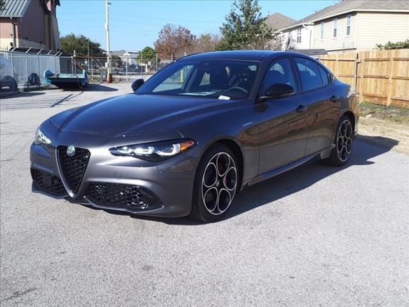 2024 Alfa Romeo Giulia Veloce in a Vesuvio Gray Metallic exterior color and Blackinterior. Northside Imports Houston 281-475-4549 northsideimportshouston.com 