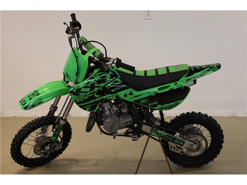 2021 Kawasaki KX 65 in a Green exterior color. New England Powersports 978 338-8990 pixelmotiondemo.com 