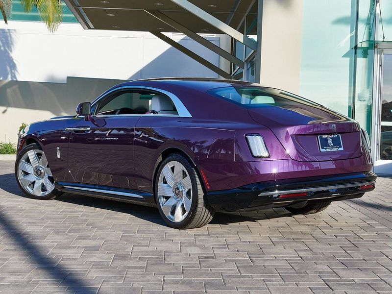 2024 Rolls-Royce Spectre  in a Twilight Purple exterior color and Arctic Whiteinterior. SHELLY AUTOMOTIVE shellyautomotive.com 