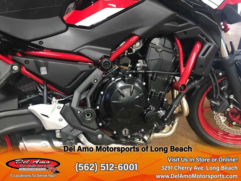 2024 Kawasaki ER650NRFAL-RD1  in a CANDY PERSIMMON RED/EBONY exterior color. Del Amo Motorsports of Long Beach (562) 362-3160 delamomotorsports.com 
