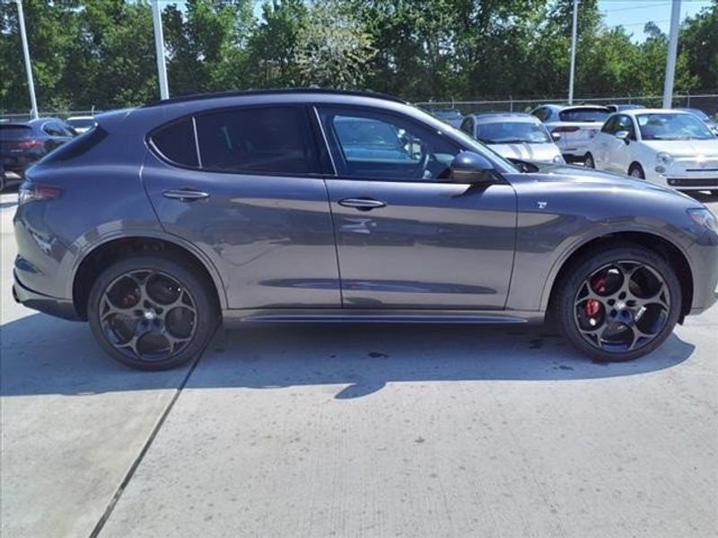 2024 Alfa Romeo Stelvio Ti in a Vesuvio Gray Metallic exterior color and Blackinterior. Northside Imports Houston 281-475-4549 northsideimportshouston.com 