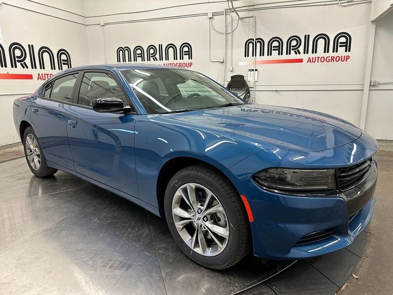 2023 Dodge Charger SXT Awd in a Frostbite exterior color and Blackinterior. Marina Chrysler Dodge Jeep RAM (855) 616-8084 marinadodgeny.com 
