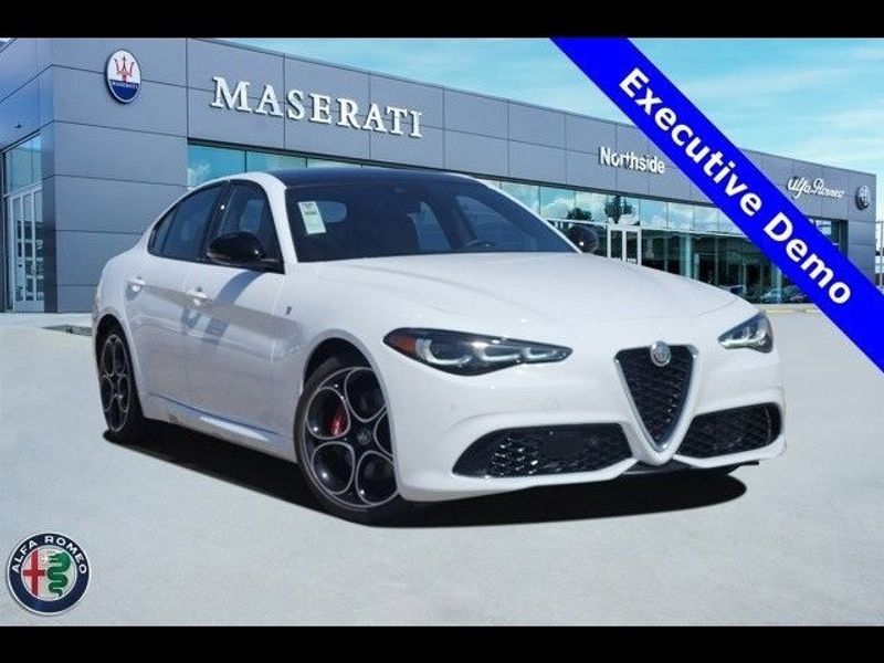 2024 Alfa Romeo Giulia Ti in a Alfa White exterior color and Saddle Browninterior. Northside Imports Houston 281-475-4549 northsideimportshouston.com 