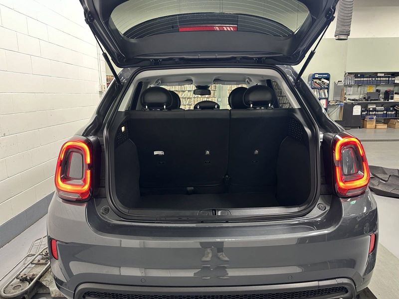 2023 Fiat 500x Sport Awd in a Grigio Moda (Graphite Gray Metallic) exterior color. Schmelz Countryside Alfa Romeo and Fiat (651) 968-0556 schmelzfiat.com 