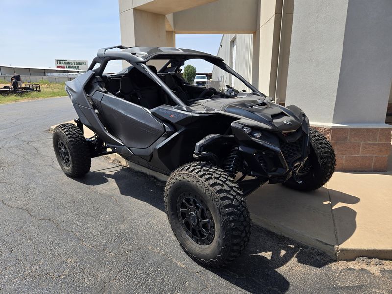 2025 Can-Am MAVERICK R X RS WITH SMARTSHOX 999T DCT TRIPLE BLACK Image 1