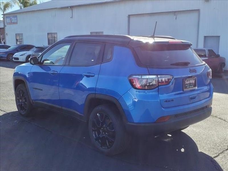 2024 Jeep Compass Latitude in a Laser Blue Pearl Coat exterior color and Blackinterior. Perris Valley Auto Center 951-657-6100 perrisvalleyautocenter.com 