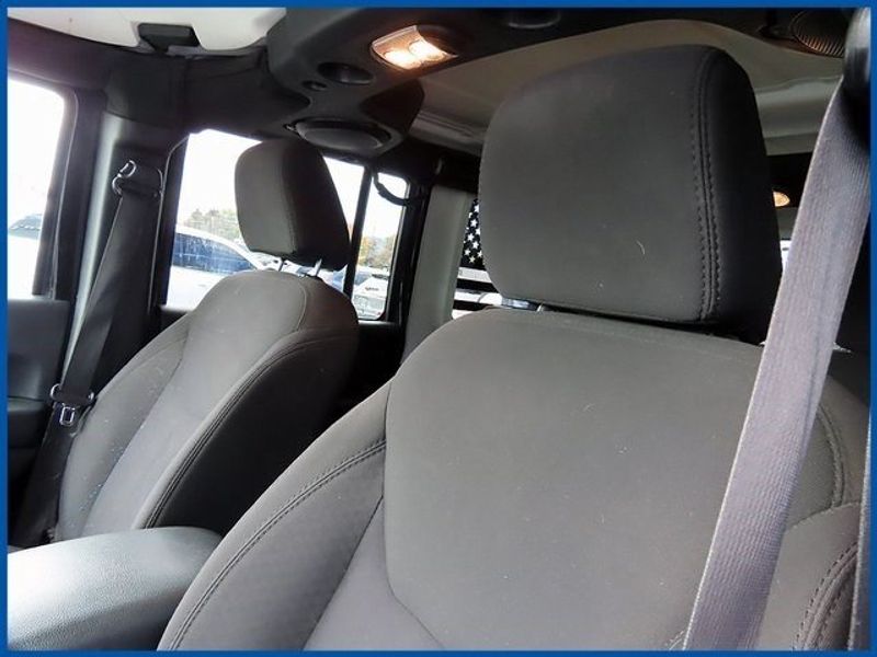 2014 Jeep Wrangler Unlimited Sport in a Black Clear Coat exterior color and Blackinterior. Papas Jeep Ram In New Britain, CT 860-356-0523 papasjeepram.com 