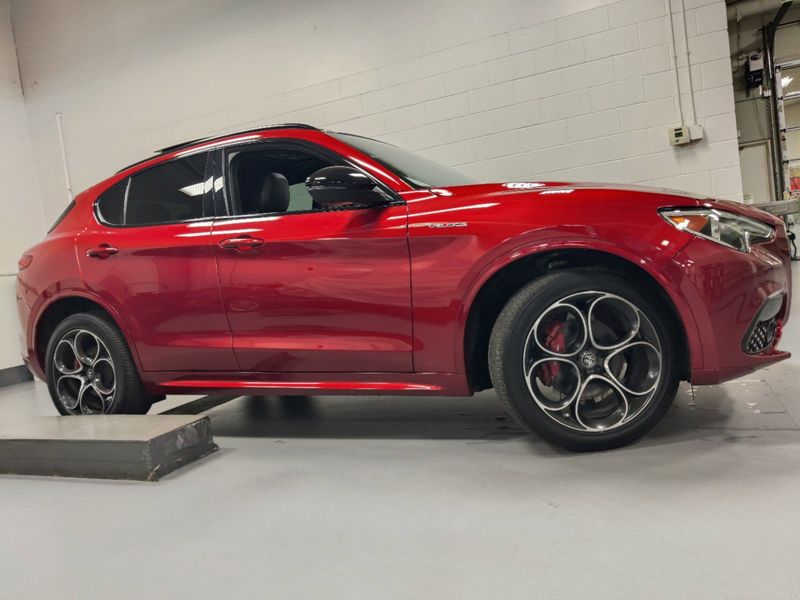 2023 Alfa Romeo Stelvio Veloce Q4 AWD w/Prem & Activ Pkg in a Rosso Etna exterior color and Black Heated Sport Leatherinterior. Schmelz Countryside Alfa Romeo (651) 867-3222 schmelzalfaromeo.com 