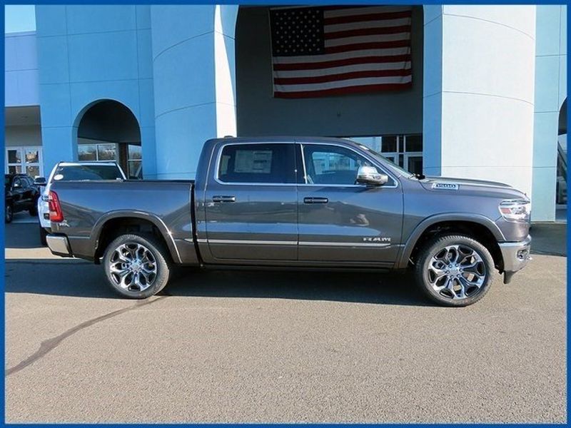 2024 RAM 1500 Limited in a Granite Crystal Metallic Clear Coat exterior color and Blackinterior. Papas Jeep Ram In New Britain, CT 860-356-0523 papasjeepram.com 