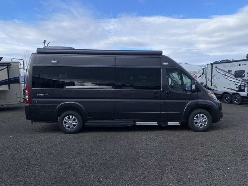 2024 ROADTREK Zion  in a Granite Metallic exterior color and White Sandinterior. Legacy Powersports 541-663-1111 legacypowersports.net 