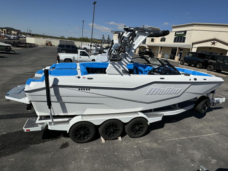 2025 MALIBU MSERIES M230  in a WHITE AND BLUE exterior color. Family PowerSports (877) 886-1997 familypowersports.com 