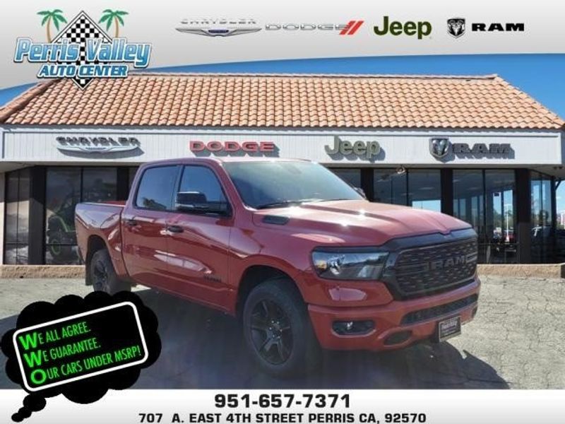 2024 RAM 1500 Big Horn Lone Star in a Flame Red Clear Coat exterior color and Blackinterior. Perris Valley Auto Center 951-657-6100 perrisvalleyautocenter.com 