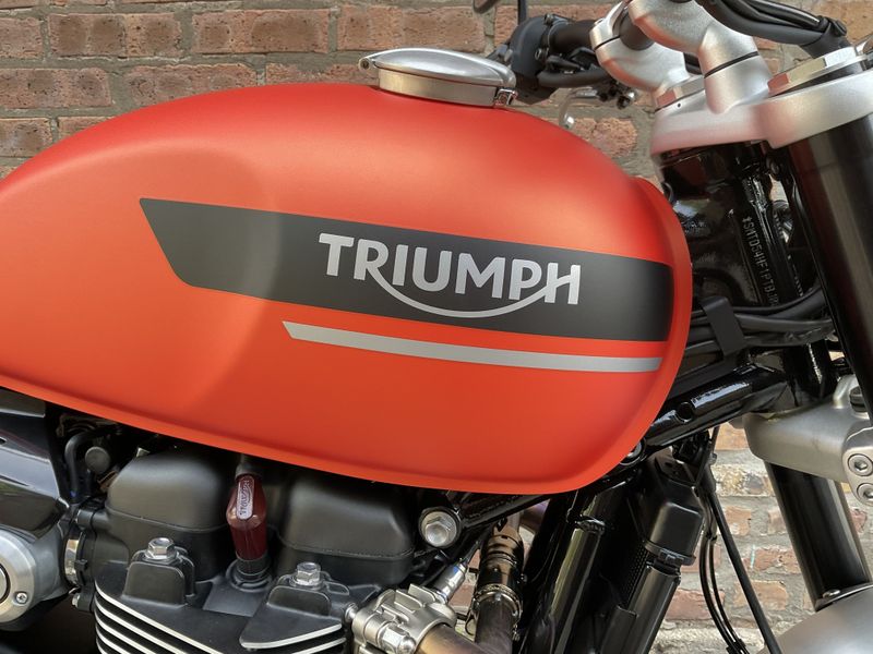 2023 Triumph Speed Twin 1200 in a Matte Baja Orange exterior color. Motoworks Chicago 312-738-4269 motoworkschicago.com 