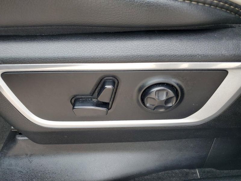 2020 RAM 1500 Laramie in a Bright White Clear Coat exterior color and Blackinterior. Johnson Dodge 601-693-6343 pixelmotiondemo.com 