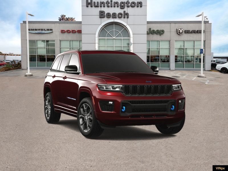 2023 Jeep Grand Cherokee 4xe Base 30th Anniversary 4x4 in a Velvet Red Pearl Coat exterior color and Global Blackinterior. BEACH BLVD OF CARS beachblvdofcars.com 