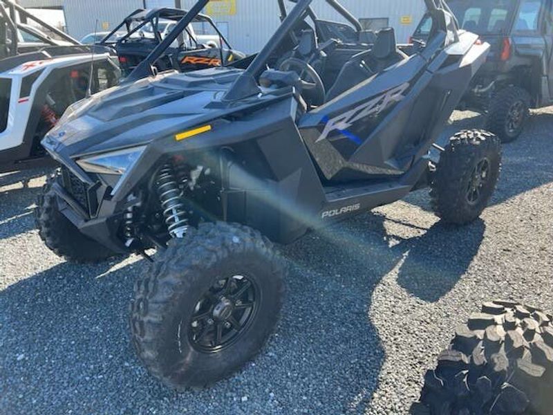 2023 Polaris RZR Pro XP Ultimate in a Red exterior color. Genuine RV & Powersports (936) 569-2523 