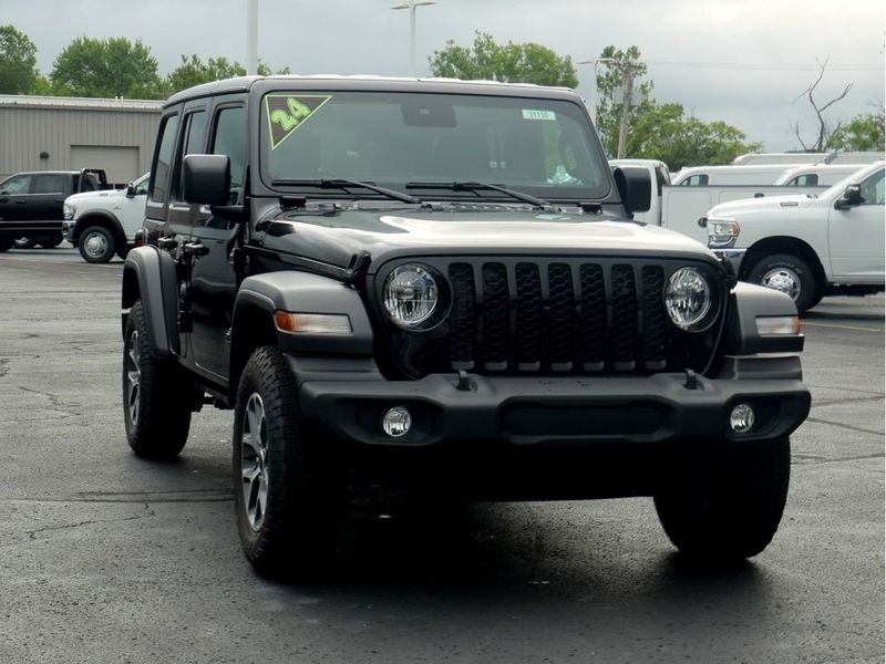 2024 Jeep Wrangler 4-door Sport S in a Black Clear Coat exterior color and Blackinterior. Paul Sherry Chrysler Dodge Jeep RAM (937) 749-7061 sherrychrysler.net 