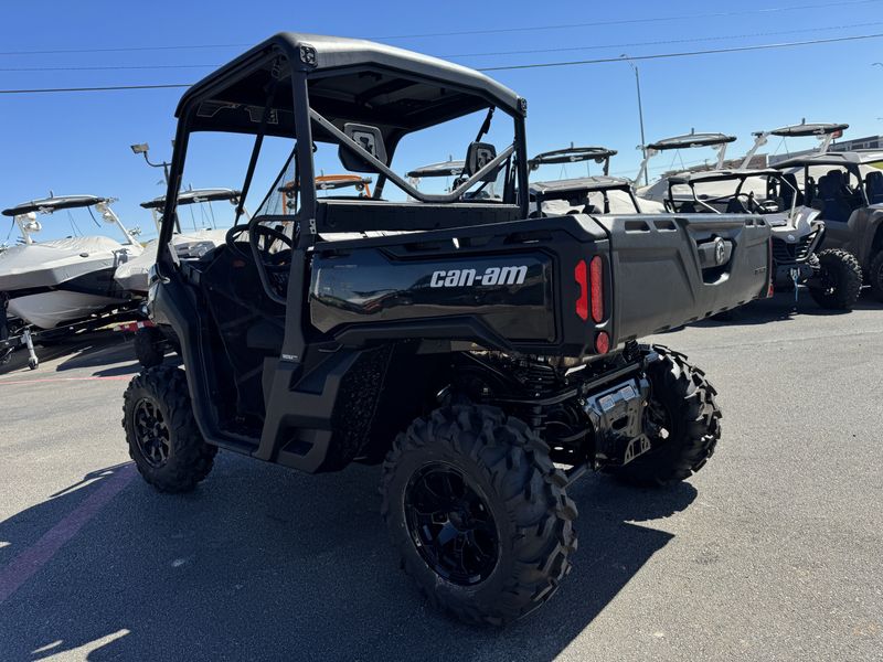 2024 CAN-AM DEFENDER XT HD10 TIMELESS BLACK  in a BLACK exterior color. Family PowerSports (877) 886-1997 familypowersports.com 