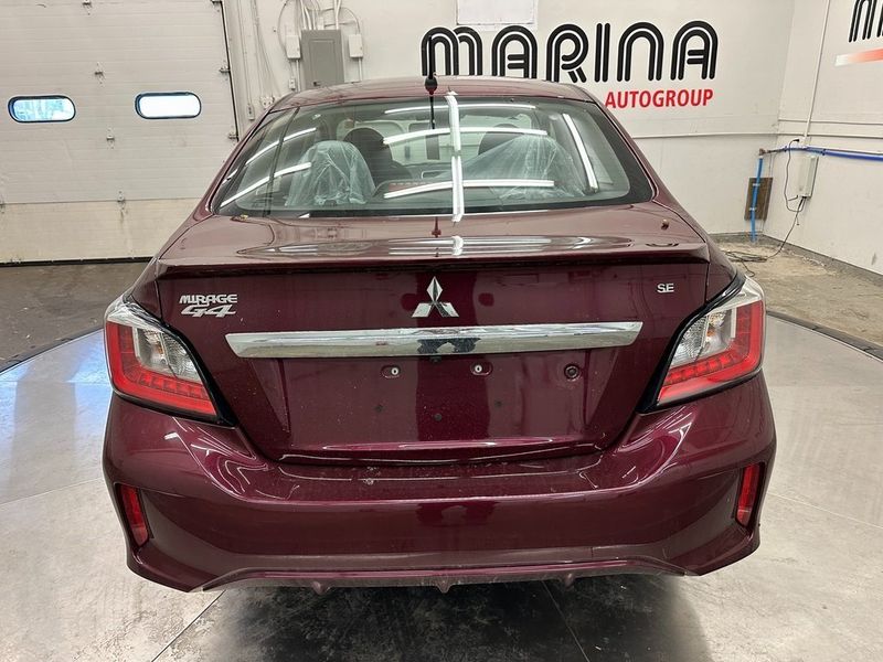 2024 Mitsubishi Mirage G4 SE in a Wine Red Metallic exterior color and Blackinterior. Marina Auto Group (855) 564-8688 marinaautogroup.com 