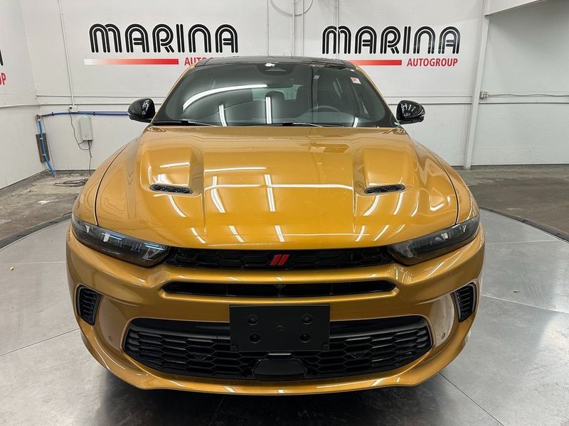 2024 Dodge Hornet R/T Plus Eawd in a Acapulco Gold exterior color and Blackinterior. Marina Auto Group (855) 564-8688 marinaautogroup.com 