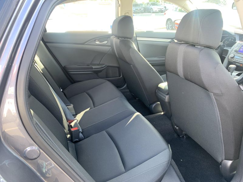 2020 Honda Civic Sedan LX in a White exterior color. BEACH BLVD OF CARS beachblvdofcars.com 