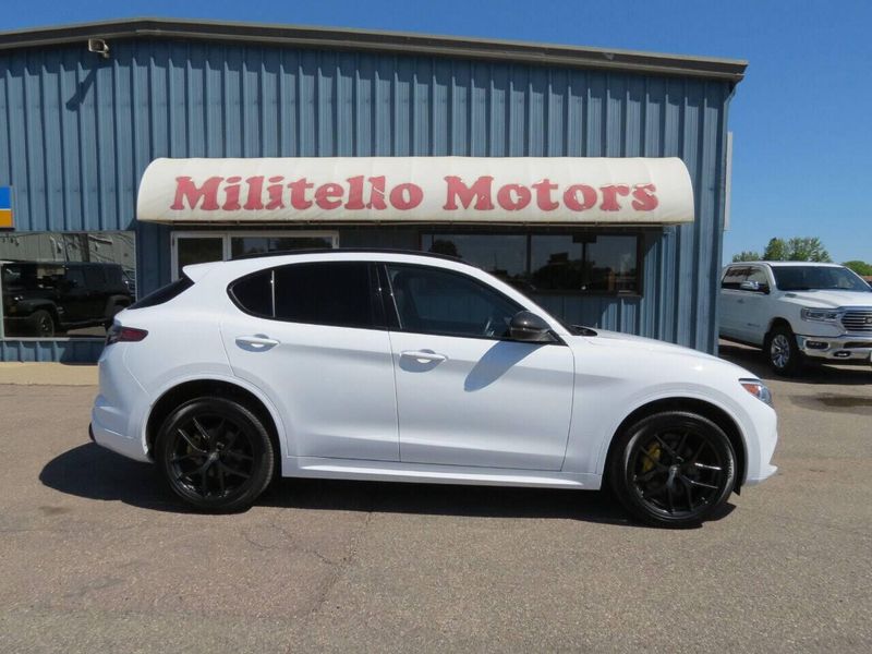 2021 Alfa Romeo Stelvio Ti Sport AWD 4dr Crossover in a White exterior color and Blackinterior. Militello Motors ​507-200-4344 militellomotors.net 