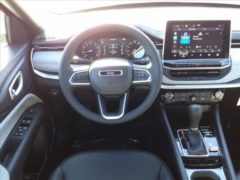 2024 Jeep Compass Latitude Lux in a Diamond Black Crystal Pearl Coat exterior color and Blackinterior. Perris Valley Auto Center 951-657-6100 perrisvalleyautocenter.com 