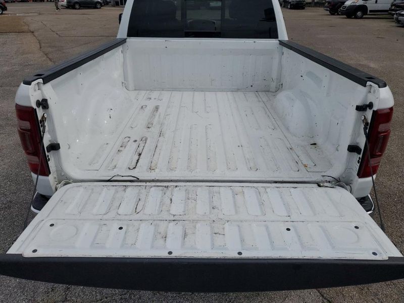 2020 RAM 1500 Laramie in a Bright White Clear Coat exterior color and Blackinterior. Johnson Dodge 601-693-6343 pixelmotiondemo.com 