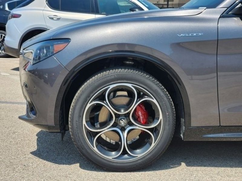 2024 Alfa Romeo Stelvio Veloce in a Vesuvio Gray Metallic exterior color and Blackinterior. Northside Imports Houston 281-475-4549 northsideimportshouston.com 