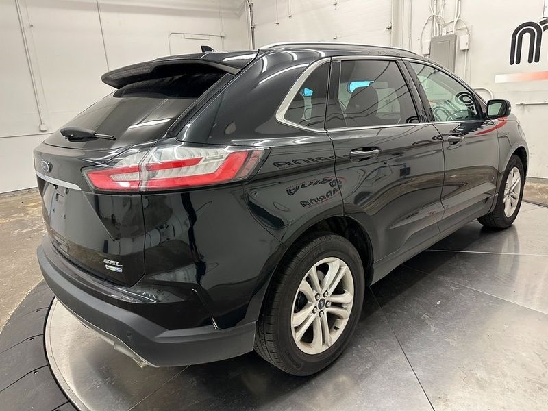 2020 Ford Edge SEL in a Agate Black exterior color and Ebonyinterior. Marina Auto Group (855) 564-8688 marinaautogroup.com 