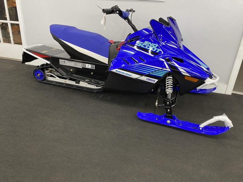 2024 Yamaha SnoScoot in a Team Yamaha Blue/ Mint exterior color. Plaistow Powersports (603) 819-4400 plaistowpowersports.com 