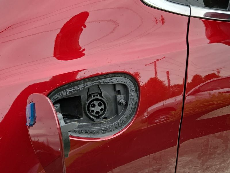 2023 Chrysler Pacifica Plug-in Hybrid Touring L in a Velvet Red Pearl Coat exterior color and Black/Alloy/Blackinterior. Dave Warren Chrysler Dodge Jeep Ram (716) 708-1207 davewarrenchryslerdodgejeepram.com 