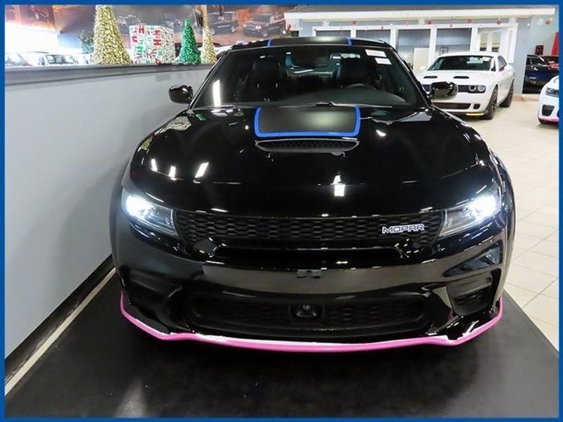 2023 Dodge Charger R/T Scat Pack Widebody in a Pitch Black exterior color and Blackinterior. Papas Jeep Ram In New Britain, CT 860-356-0523 papasjeepram.com 